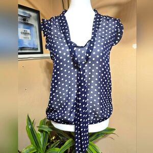 Sheer Navy Polka Dot Ruffle Sleeveless Blouse w/ Tie Front. Size XS